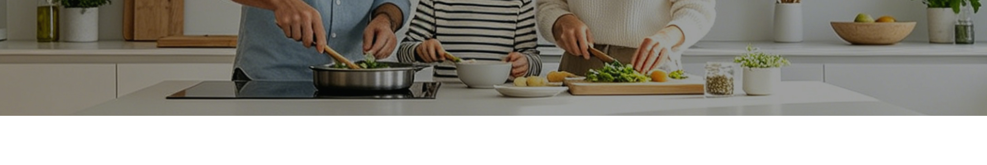 A family cooking together in the kitchen